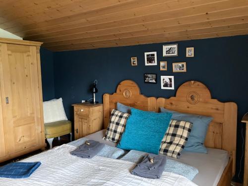 Postel nebo postele na pokoji v ubytování 4 Elements Appartmenthaus Monarda