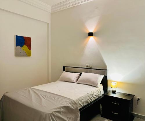 Llit o llits en una habitació de Appartement JM