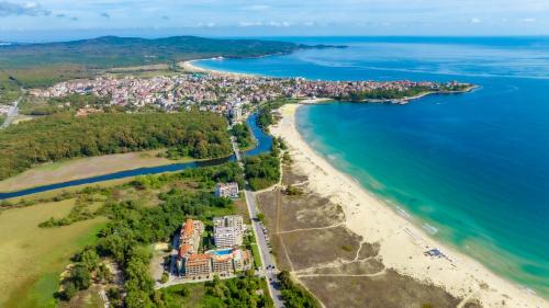 an aerial view of a beach and the ocean at Aparthotel Hotel Prestige City II in Primorsko