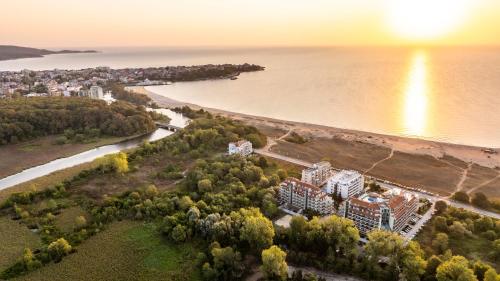 an aerial view of a beach and the ocean at Aparthotel Hotel Prestige City II in Primorsko