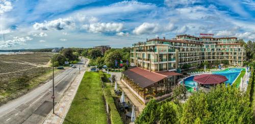 a view of a hotel and a street with a building at Aparthotel Hotel Prestige City II in Primorsko