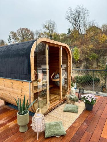 a gazebo on top of a deck at Aparthotel Na Klenici in Mladá Boleslav