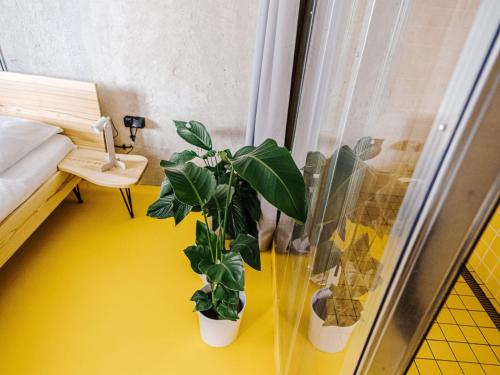 Una cama o camas en una habitación de Silesia LOFT