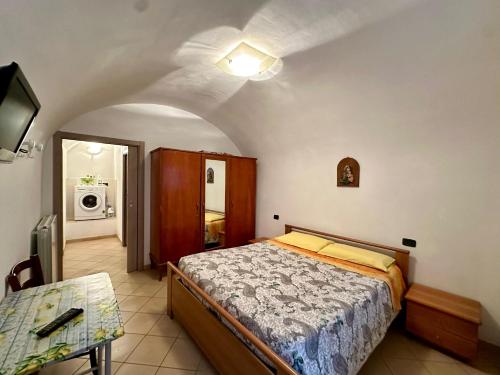 Ένα ή περισσότερα κρεβάτια σε δωμάτιο στο Casa Vicolo ai Campi