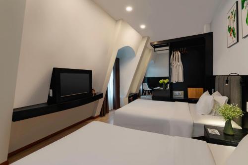 Кровать или кровати в номере Nature Hotel - Luong The Vinh