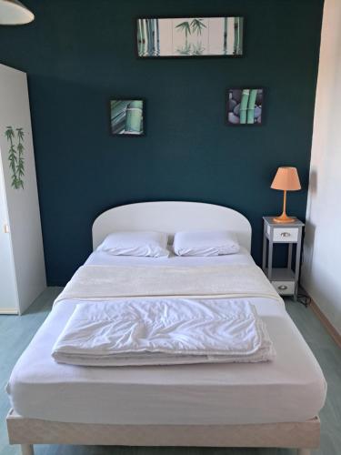 Postel nebo postele na pokoji v ubytování Le porquerolle