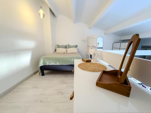 Postel nebo postele na pokoji v ubytování Appartement Le Vauban - 40m2 à Frontignan Plage - À 200m de la Plage - 15 min de Sète