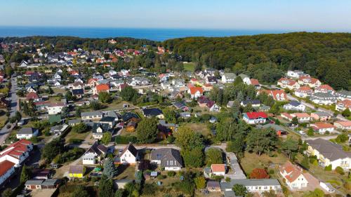 an aerial view of a small town with houses at Haus 5 Elemente- Fewo Luft mit Terrasse und Bio-Kamin in Ostseebad Koserow