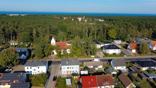 an aerial view of a small town with houses at Haus 4 Jahreszeiten- Fewo Sommer mit Terrasse und Bio-Kamin in Ostseebad Karlshagen