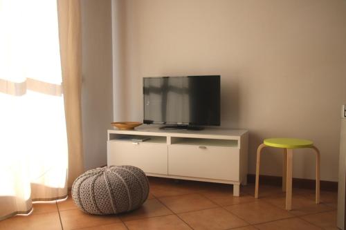 A television and/or entertainment centre at Appartamento 20 - Theater Home