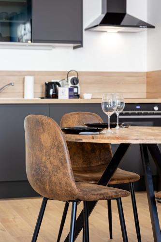 Η κουζίνα ή μικρή κουζίνα στο L'apparté un F2 cosy et moderne refait à neuf