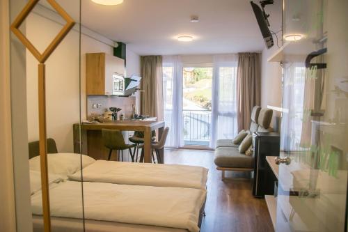 Voodi või voodid majutusasutuse Appartement Alpenrauschen toas