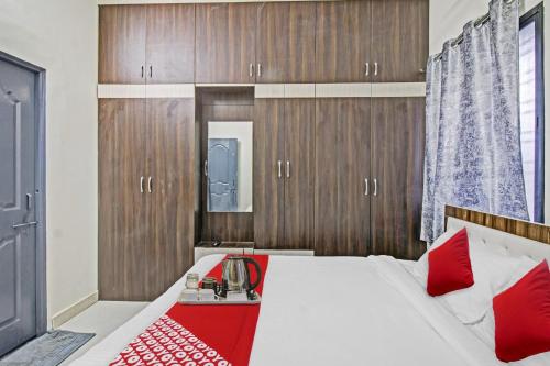 Katil atau katil-katil dalam bilik di Hotel O Pritesh Grand