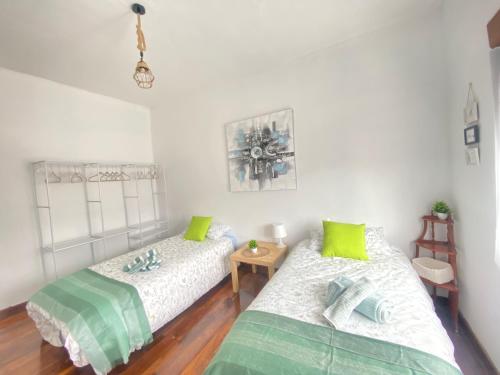 Ένα ή περισσότερα κρεβάτια σε δωμάτιο στο Itos Flats Pravia