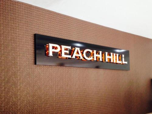 Сертификат, награда, вывеска или другой документ, выставленный в Peach Hill Hotel & Cafe