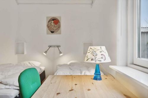 Ένα ή περισσότερα κρεβάτια σε δωμάτιο στο Cozy House By Roskilde Fjord