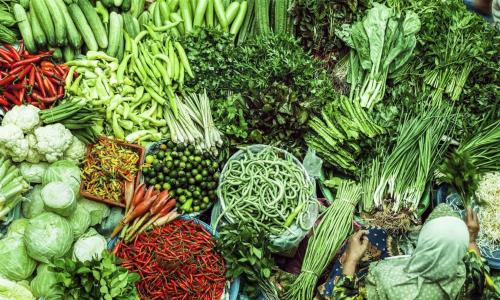 a pile of vegetables on display at a market at THE ROOM2 @ Zishi in Kota Bharu