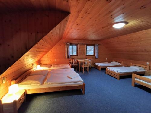 Posteľ alebo postele v izbe v ubytovaní Apartmány Ski areal Kareš