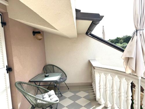 Балкон или терраса в NellaToni Apartments