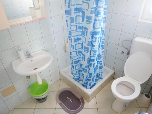 Koupelna v ubytování Apartments Bili