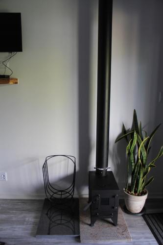 TV a/nebo společenská místnost v ubytování Ashaanas
