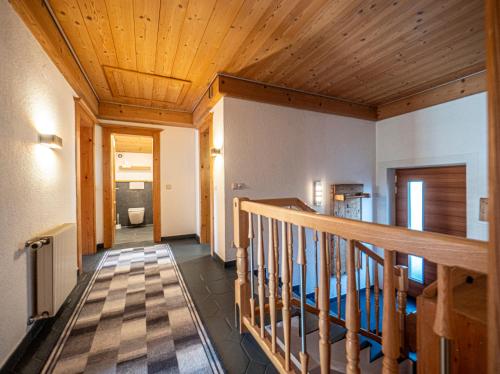 a hallway of a house with a wooden ceiling at Ferienwohnung Zillertal - Schwemberger in Fügen