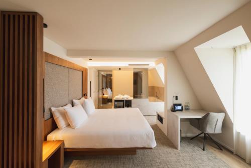 Postel nebo postele na pokoji v ubytování Begijnhof Hotel