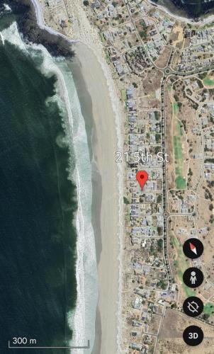 a map of the beach with a red heart on it at 21 On the Green in Stompneusbaai