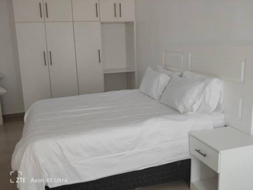 Ένα ή περισσότερα κρεβάτια σε δωμάτιο στο Silver Moon