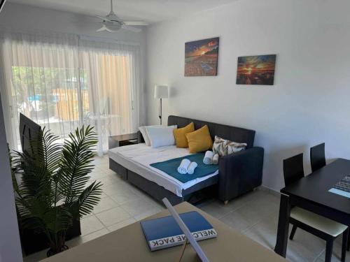 Katil atau katil-katil dalam bilik di Beautiful Garden Apartment