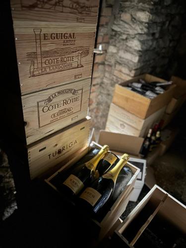 two bottles of wine are in a box at Hotel Croce Federale in Bellinzona