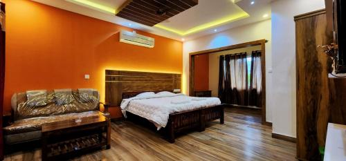 Postel nebo postele na pokoji v ubytování Neyyar Heritage Inn - Home Stay , Trivandrum