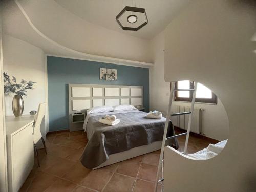 Postel nebo postele na pokoji v ubytování B&B Mast’ Nicola