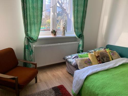 Postel nebo postele na pokoji v ubytování Mníchov dvor