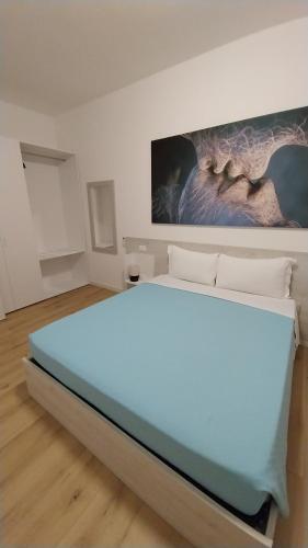 Postel nebo postele na pokoji v ubytování Via San Zeno Home