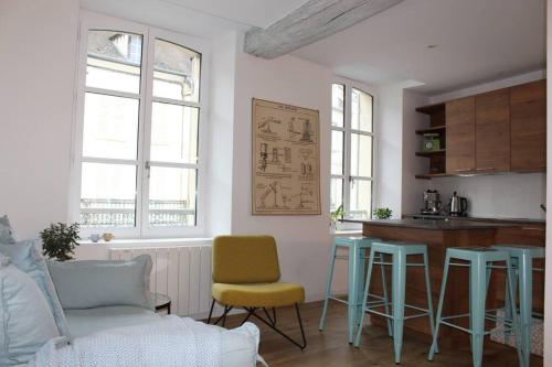 Posezení v ubytování Maison l'Héritage by La Boîte en Plus
