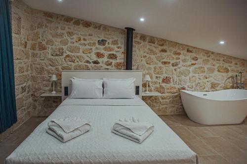 Voodi või voodid majutusasutuse Theasis Beachfront Villa with Terrace seconds from the Beach by Hospi toas