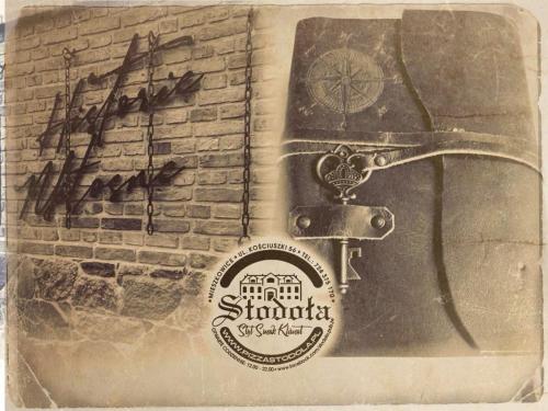 an old photo of a key on a brick wall at Wellness Apartment, Spa i Sauna in Mieszkowice