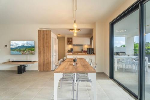Kuchyň nebo kuchyňský kout v ubytování Appartement Rock Bay, à 300m de la plage