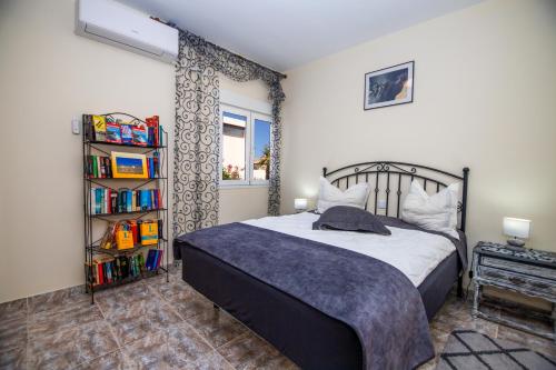 Ένα ή περισσότερα κρεβάτια σε δωμάτιο στο Casa Las Palmeras