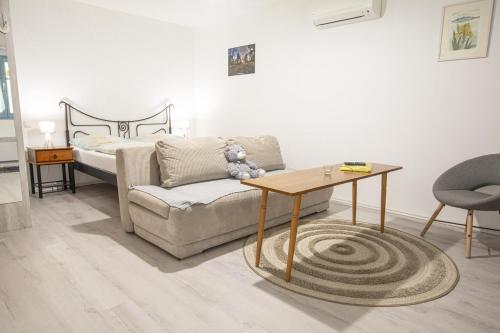 Postel nebo postele na pokoji v ubytování Apartmány Uprostřed zeleně