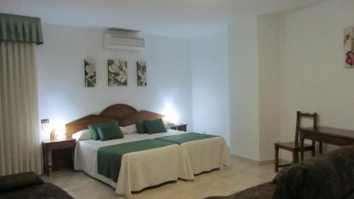Postel nebo postele na pokoji v ubytování Hostal Vista Alegre