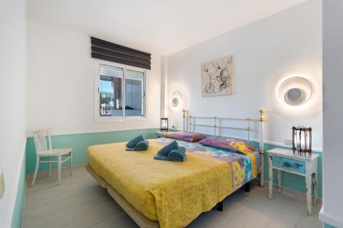 Postel nebo postele na pokoji v ubytování Relax Holidays Corralejo