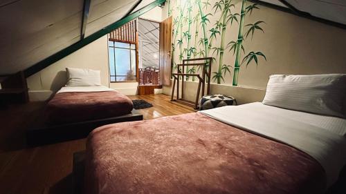 Postel nebo postele na pokoji v ubytování Nuwara Eliya Holiday Home