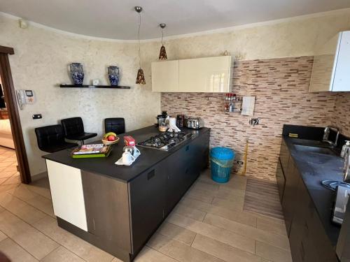 Kuchyň nebo kuchyňský kout v ubytování Marco Simone Home