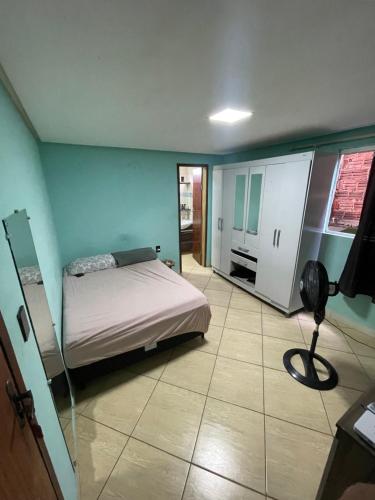 En eller flere senge i et værelse på Casa da paz