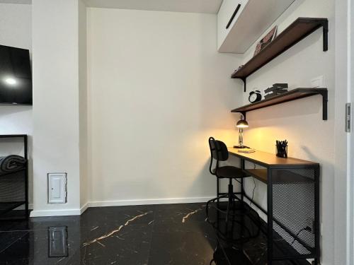 a desk in a room with a white wall at Kalinkovo a whole new house close to X Bionic 10min in Kalinkovo