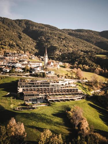 an aerial view of a building with a church at Santre dolomythic home in Bressanone