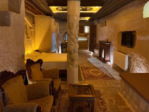 Televisyen dan/atau pusat hiburan di Dionysos Cave Cappadocia Hotel