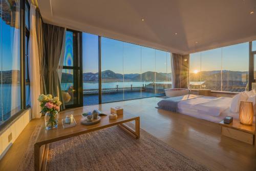 Dali Muhai Island Designer Seaview Manor 객실 침대